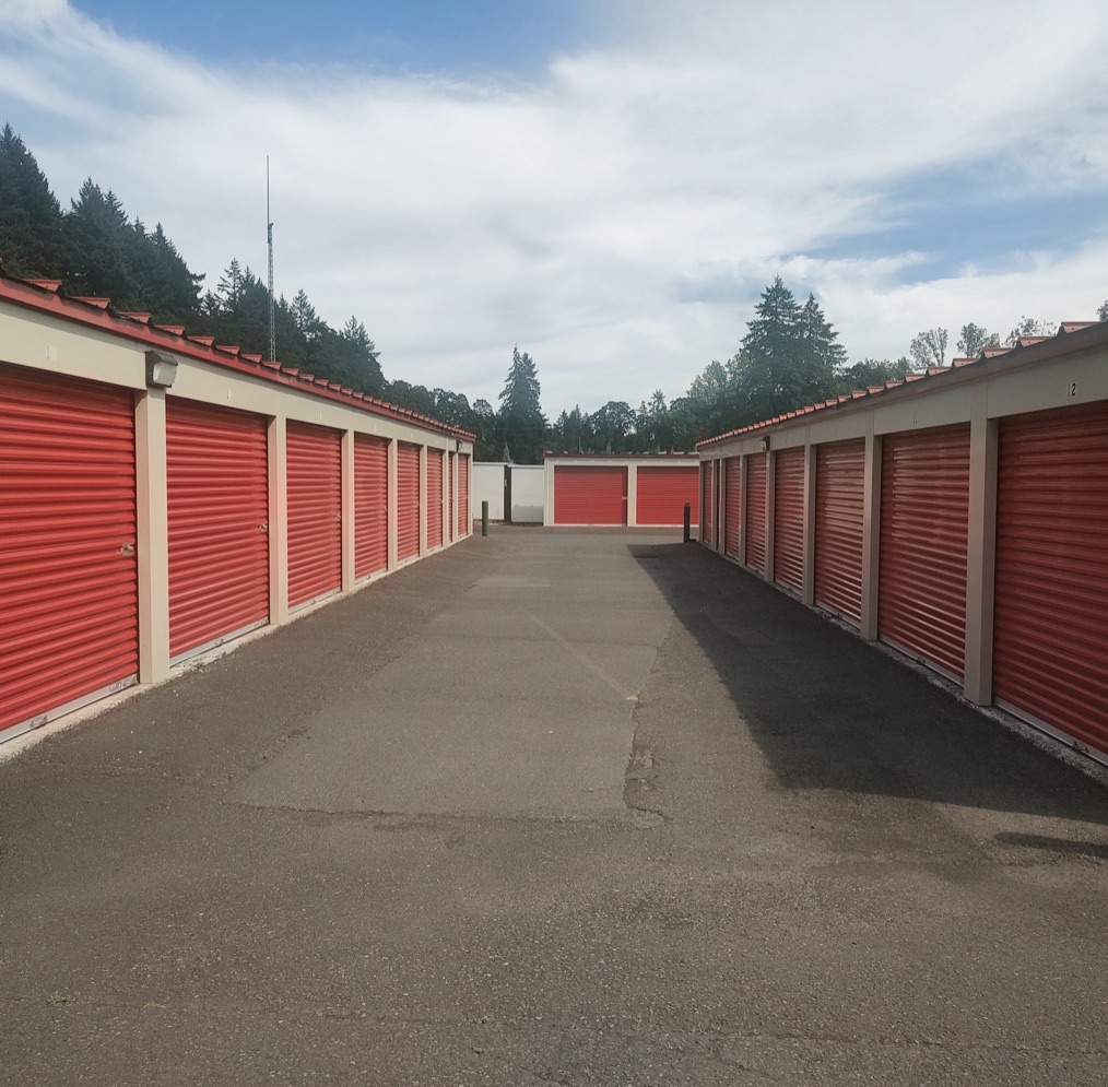 A row of red roll-up storage unit doors at Hope Valley Self Storage.